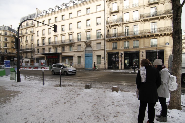Designed in 1732 by Pierre de Vigny, the passage (where the aqua door is) became home to a mini-metal works shops.  During the Rev of 1830 the metal objects were taken to be used as weapons during the uprising.  The passage succumbed to urbanism and demolished in the early 1920s.  The winged dragon that sits above the door was dismantled in 1957 and carried off to the Louvre.  