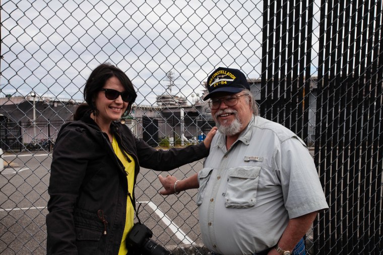 USS CONSTELLATION in the background.  